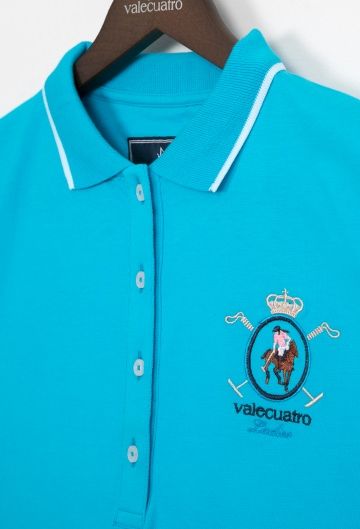 Polo clásico turquesa escudo Valecuatro de mujer