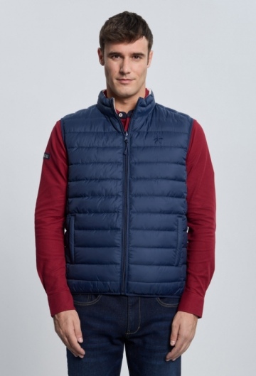 Chaleco acolchado reversible azul marino con blanco roto